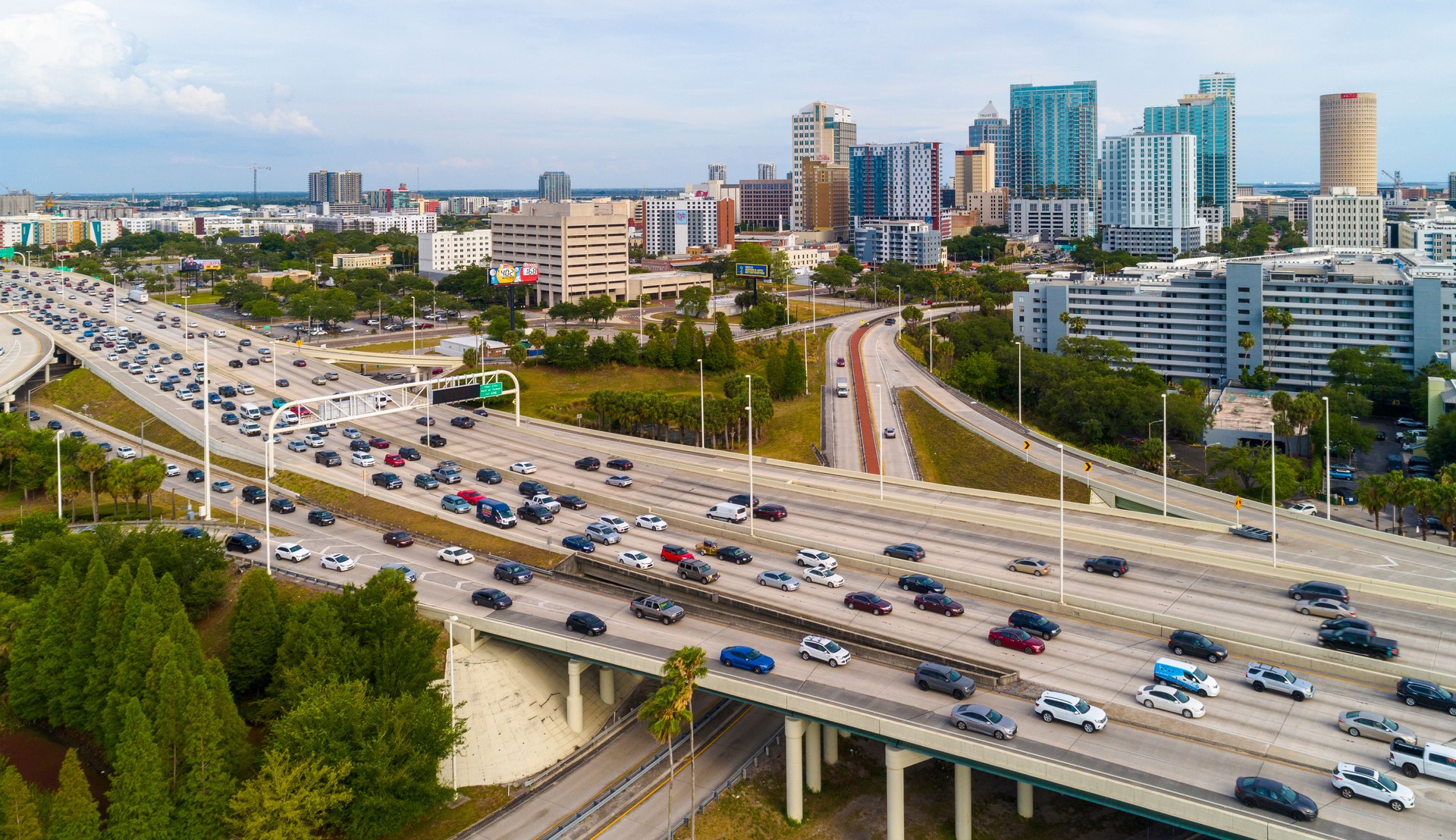 Aerial skyline of Tampa, Florida. Distant view of Downtown Tampa over the Hillsborough River and big transport junction.